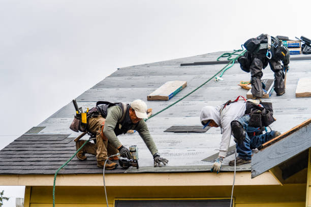 Professional Roofing technician working in Kennebunkport, ME